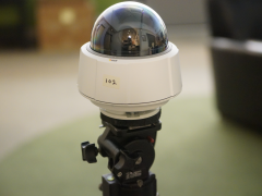 Axis PTZ camera mounted on standard tripod